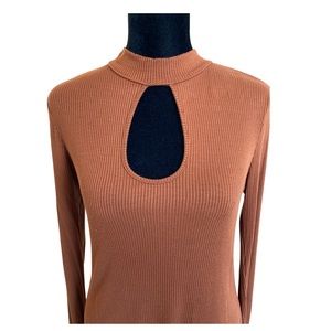 Form fitting knit dress with keyhole.